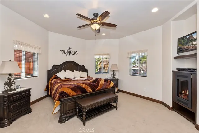 a bedroom with bed and window