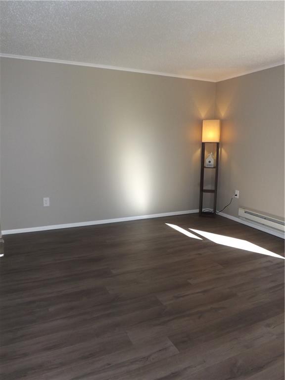 222 Harbison Road Sarver, PA 16055 - Photo 8 of 21 an empty room with wooden floor and windows