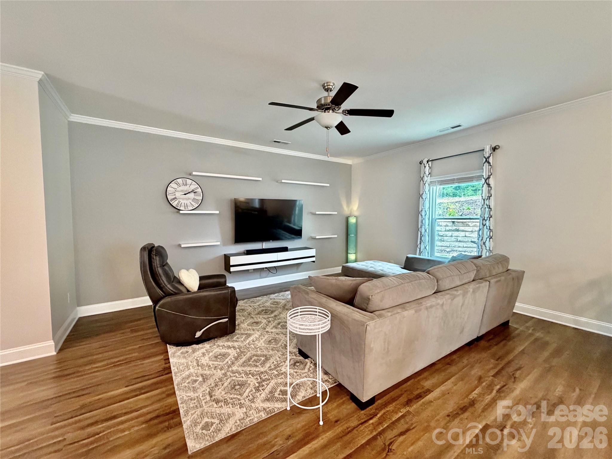 1220 Pecan Ridge Road Fort Mill, SC 29715 - Photo 5 of 25 a living room with furniture and a window
