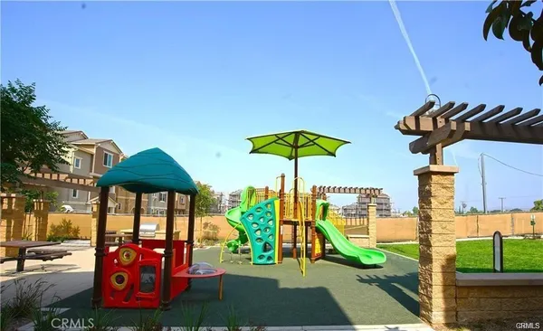 a view of chairs and tables in the patio