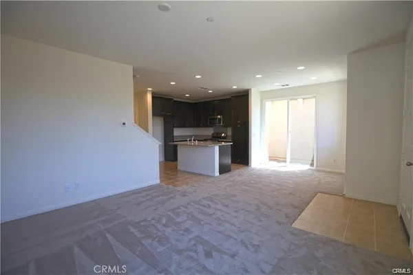 a view of a kitchen with a sink