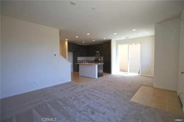 a view of a kitchen with a sink