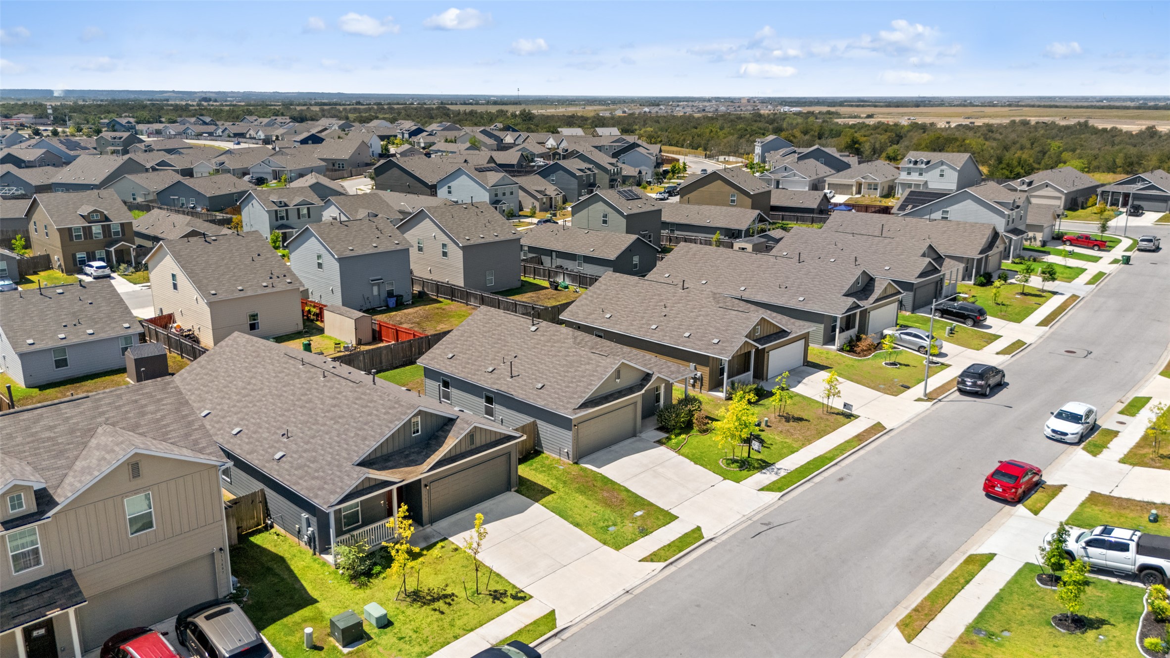 13803 Tordillo Drive Elgin, TX 78621 - Photo 29 of 39 Aerial perspective of suburban area