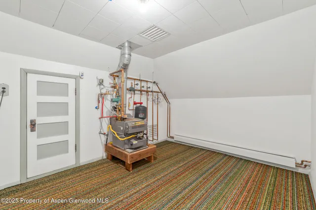 a view of wooden floor with windows