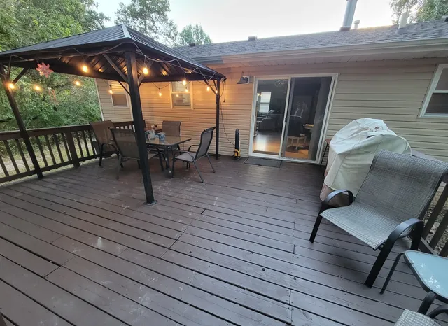 an outdoor space with furniture