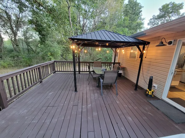 a view of a patio on the roof deck