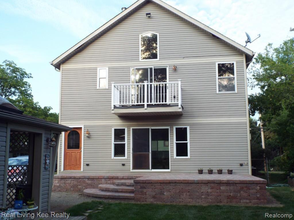 286 Sisson Street Romeo, MI 48065 - Photo 58 of 73 rear of home with patio.jpg