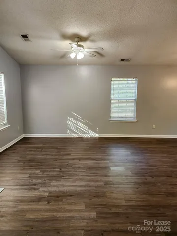 a view of an ocean & kitchen in a room