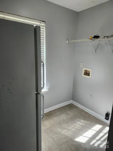 a view of a room with rack on the wall