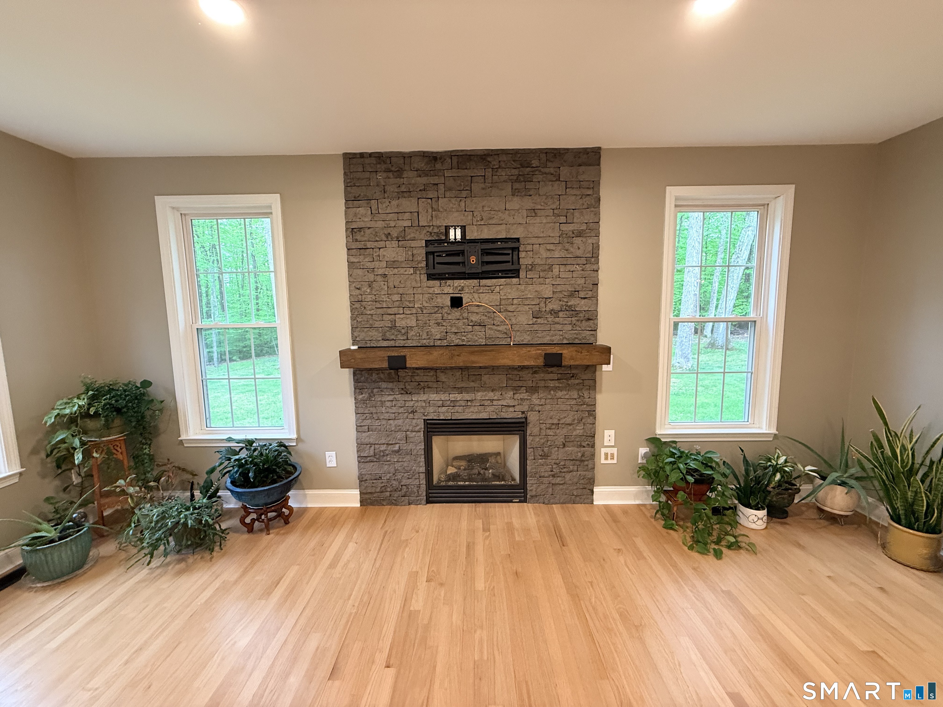 85 Old Rod Road Colchester, CT 06415 - Photo 6 of 40 Main level living room with grand stone fireplace