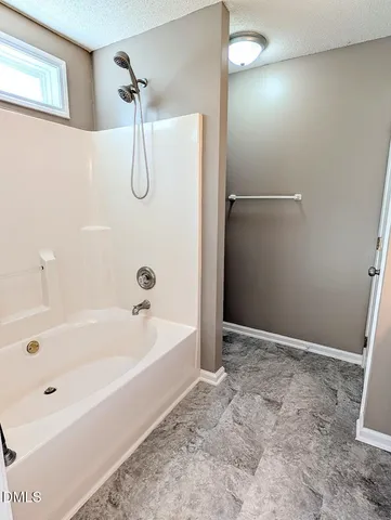 a bathroom with a bathtub