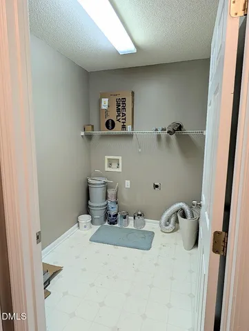 a view of balcony with wooden floor and fence