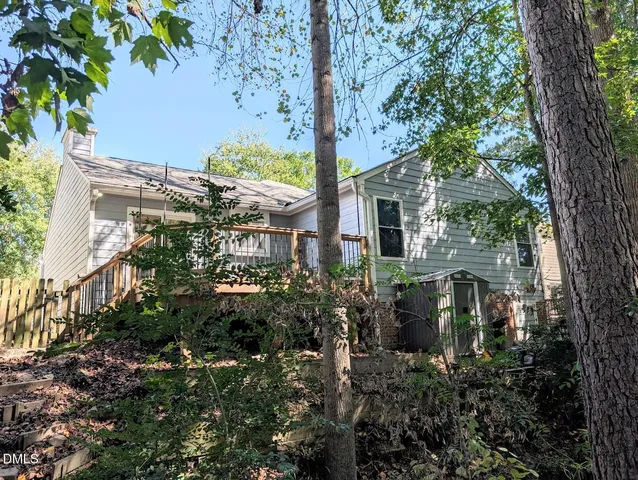 a view of a pathway with a bench