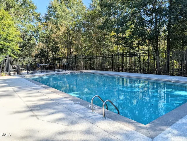 a view of house with outdoor space and sitting area