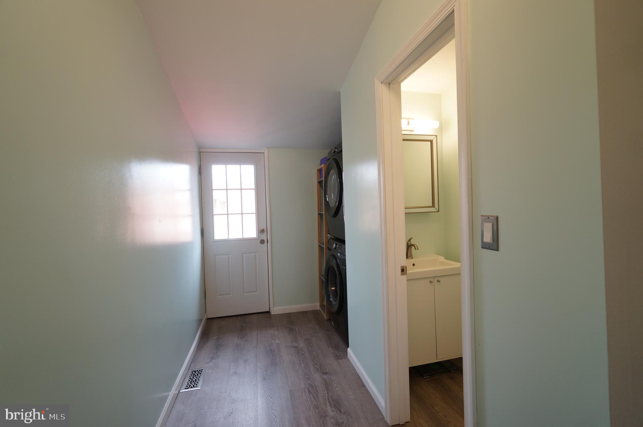 3509 Keswick Road Baltimore, MD 21211 - Photo 11 of 38 Rear hall to half bath and laundry