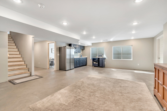 3232 West 1670th Street North Provo, UT 84601 - Photo 32 of 33 Below grade area featuring freestanding refrigerator and recessed lighting