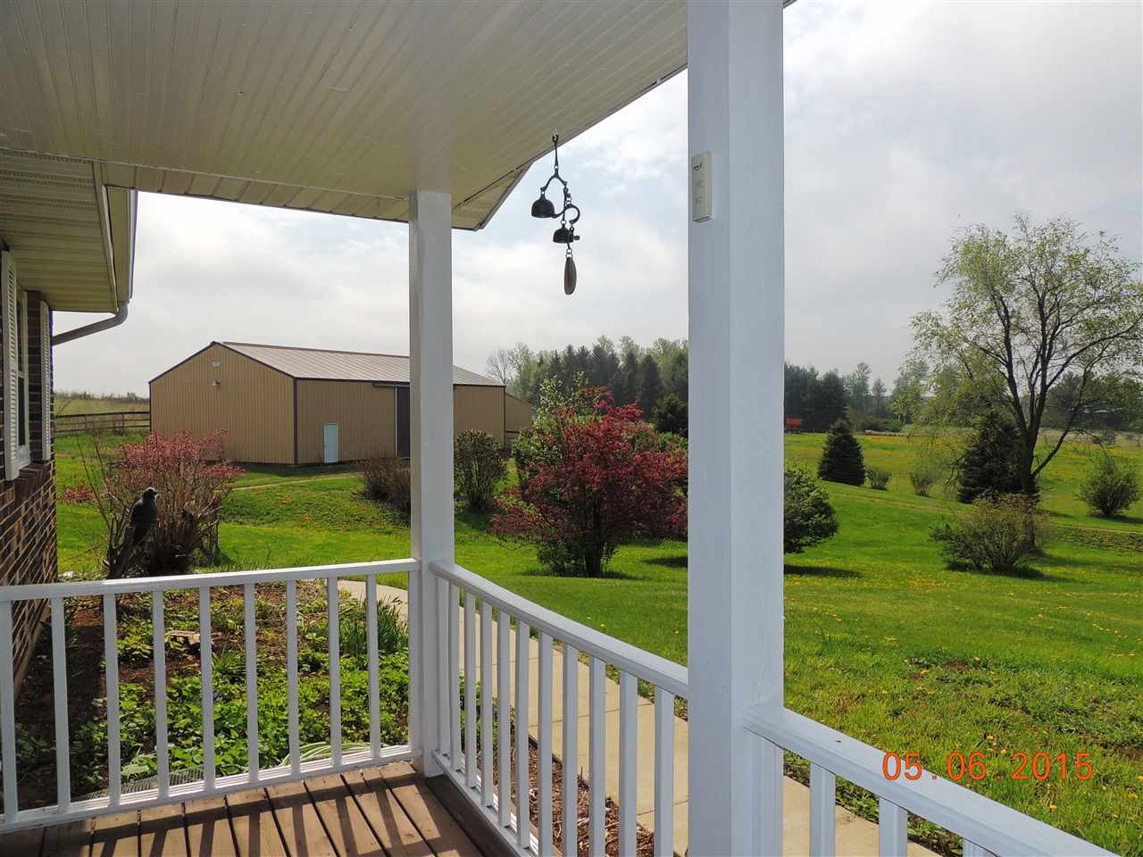 16349 Best Road Davis, IL 61019 - Photo 3 of 25 a view of a porch with a yard