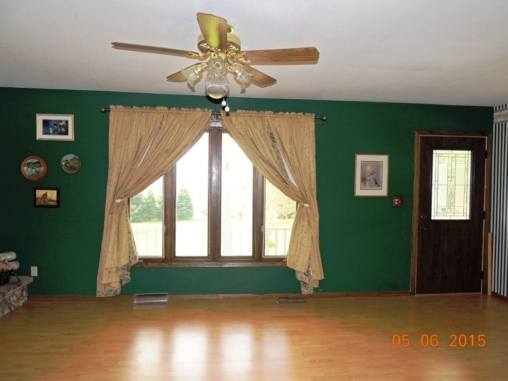 16349 Best Road Davis, IL 61019 - Photo 8 of 25 a view of an empty room with a window