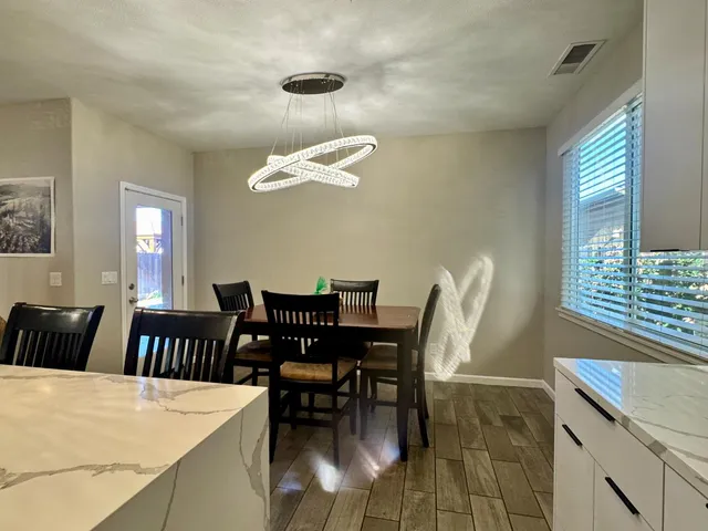 a view of a dining room with furniture