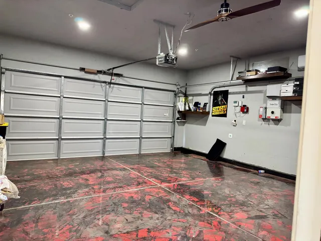 a dining room with furniture and a window