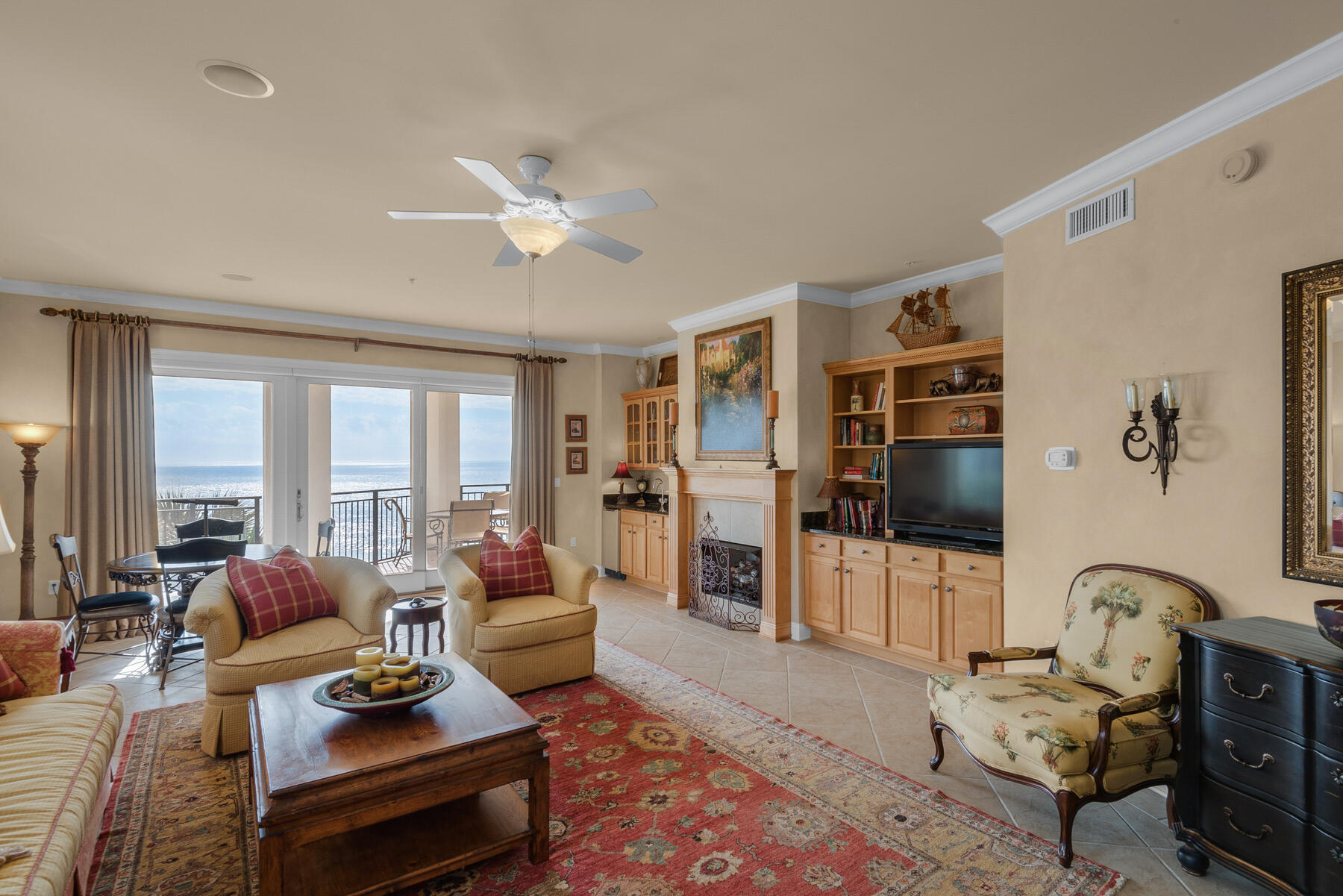 56 Blue Mountain Road, Unit A201 Santa Rosa Beach, FL 32459 - Photo 13 of 76 a living room with furniture ceiling fan and a rug