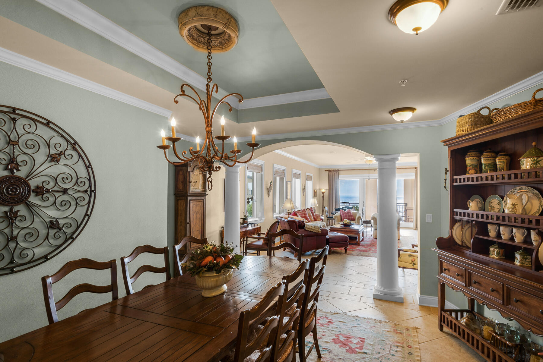 56 Blue Mountain Road, Unit A201 Santa Rosa Beach, FL 32459 - Photo 21 of 76 a view of a dining room with furniture and chandelier