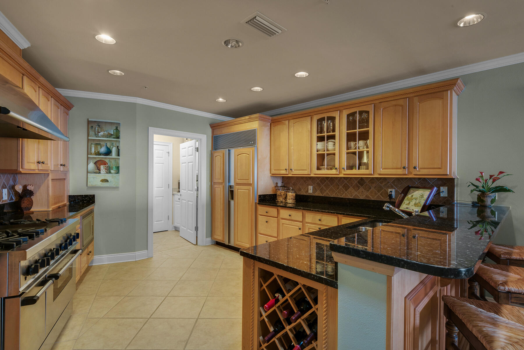 56 Blue Mountain Road, Unit A201 Santa Rosa Beach, FL 32459 - Photo 24 of 76 a kitchen with a sink appliances and cabinets