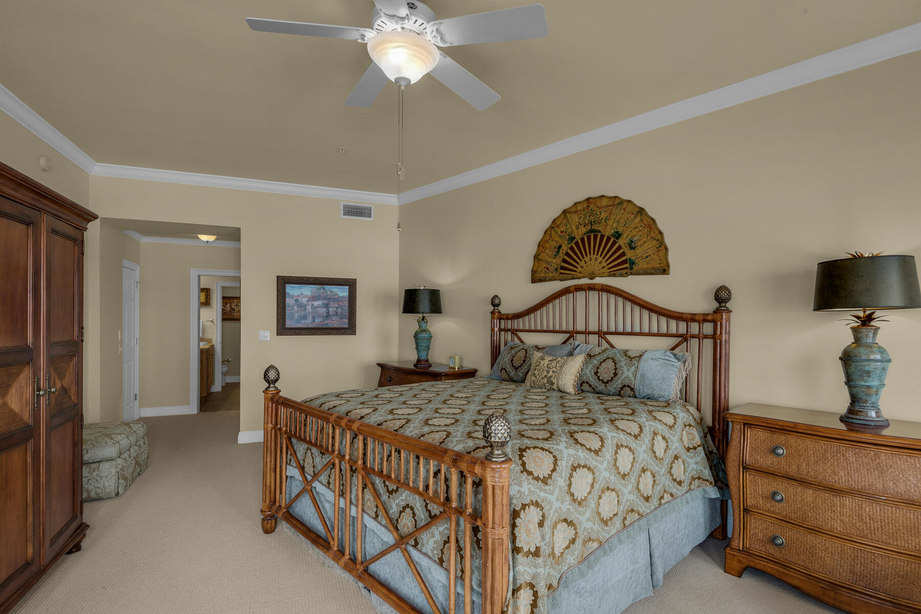 56 Blue Mountain Road, Unit A201 Santa Rosa Beach, FL 32459 - Photo 34 of 76 a bedroom with a bed and a chandelier