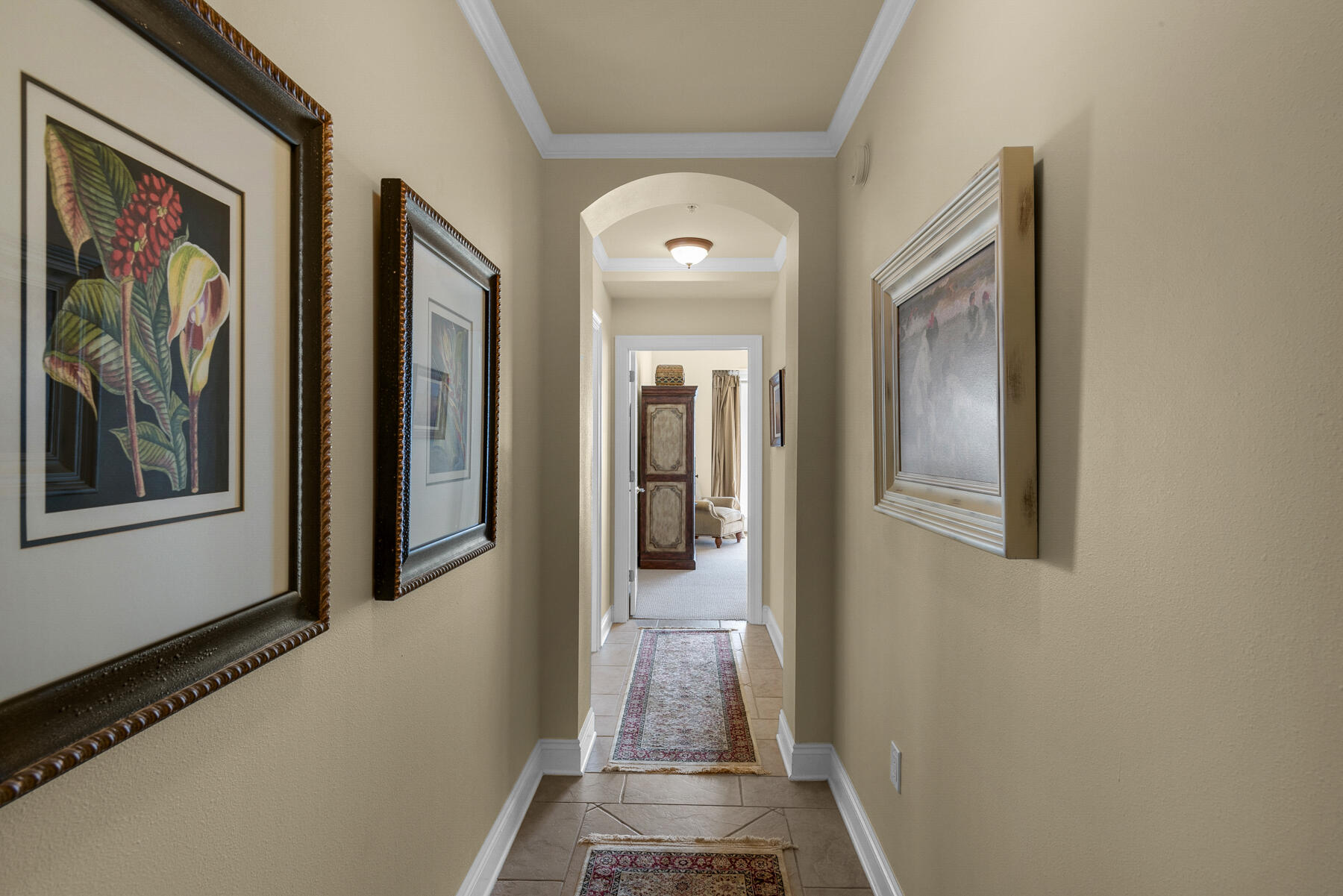 56 Blue Mountain Road, Unit A201 Santa Rosa Beach, FL 32459 - Photo 38 of 76 a view of a hallway with wooden floor and a livingroom