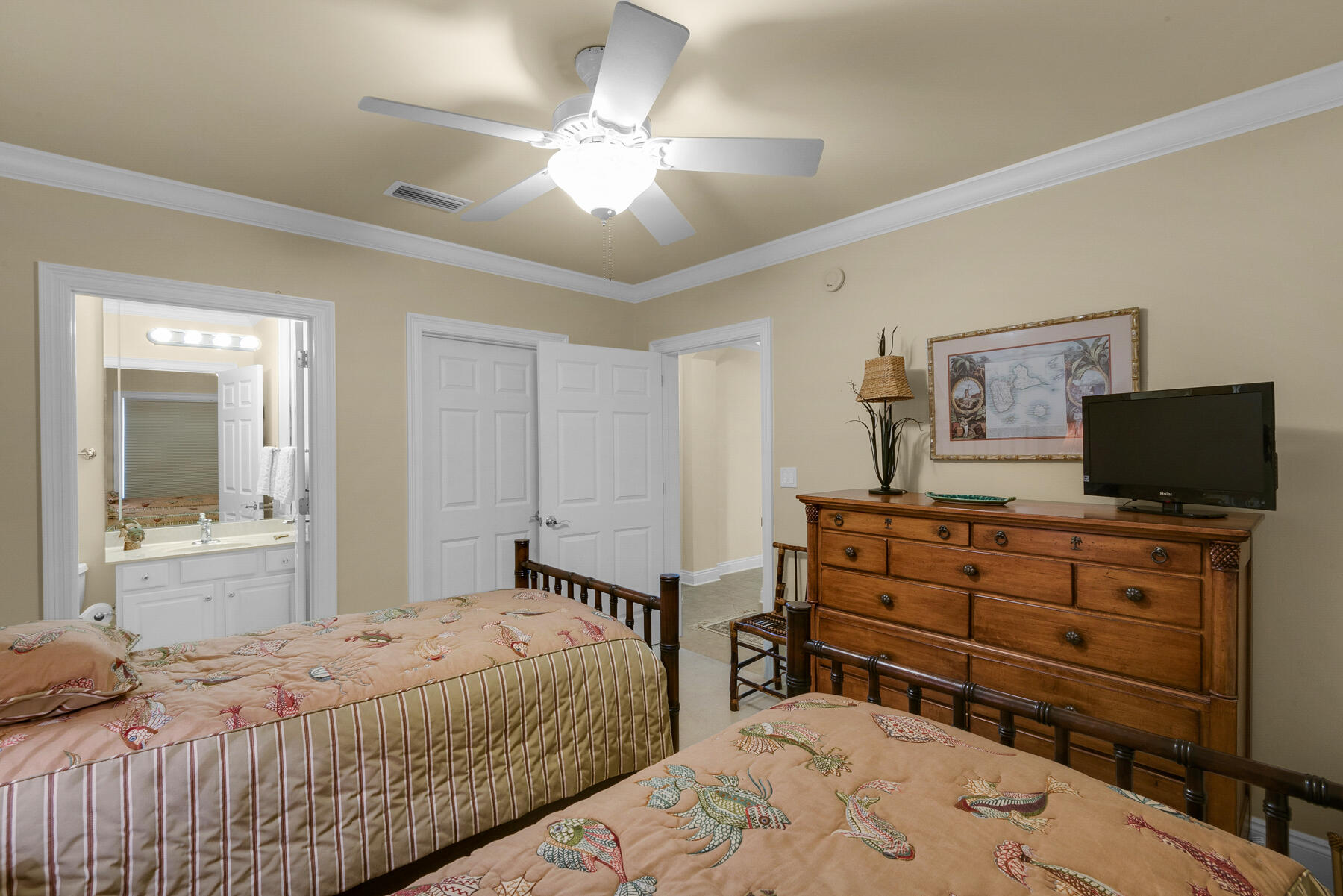56 Blue Mountain Road, Unit A201 Santa Rosa Beach, FL 32459 - Photo 48 of 76 a bedroom with a bed and flat screen tv