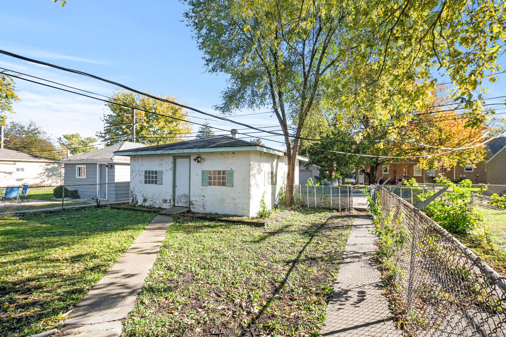 1473 Wentworth Avenue Calumet City, IL 60409 - Photo 3 of 18 a view of a house with a yard