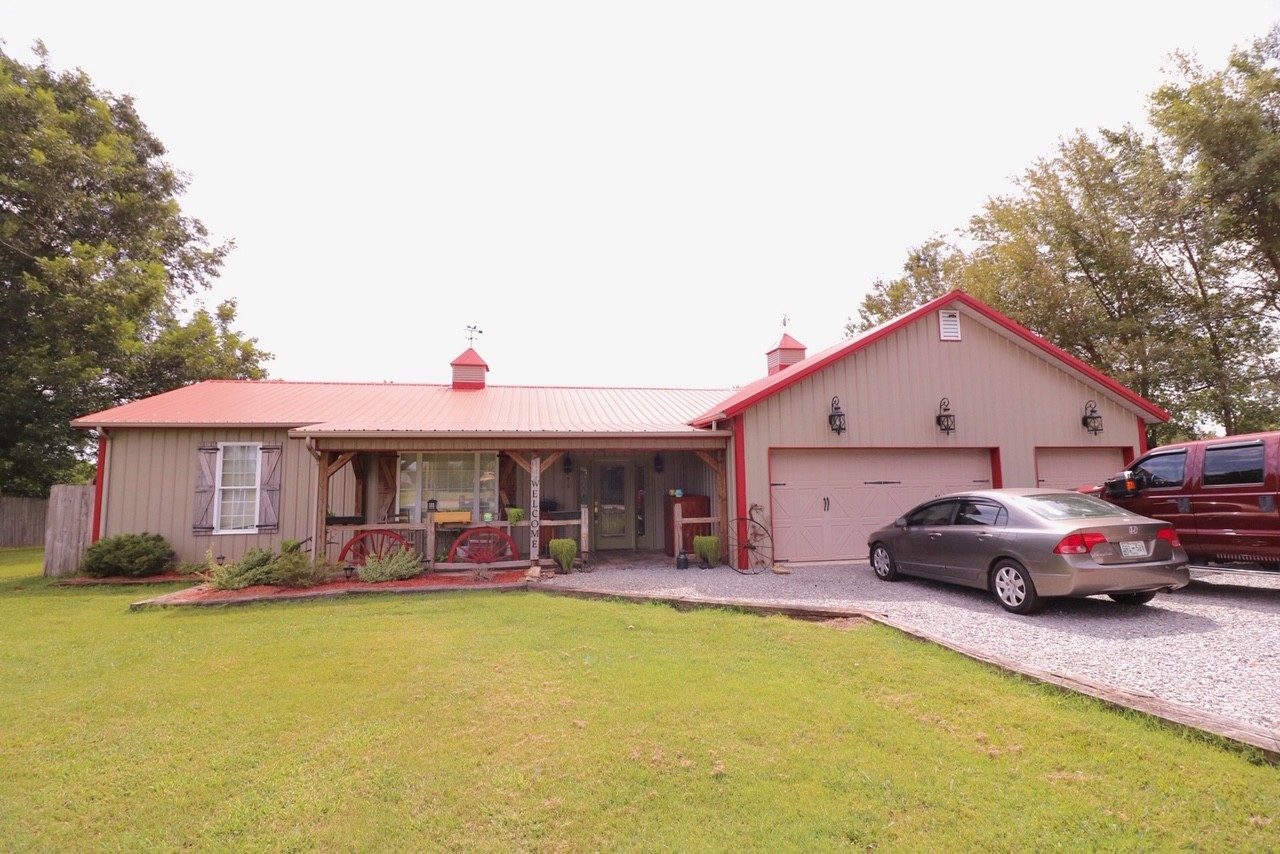 618 Denning Ford Road Portland, TN 37148 - Photo 1 of 1 a front view of house with outdoor seating and yard