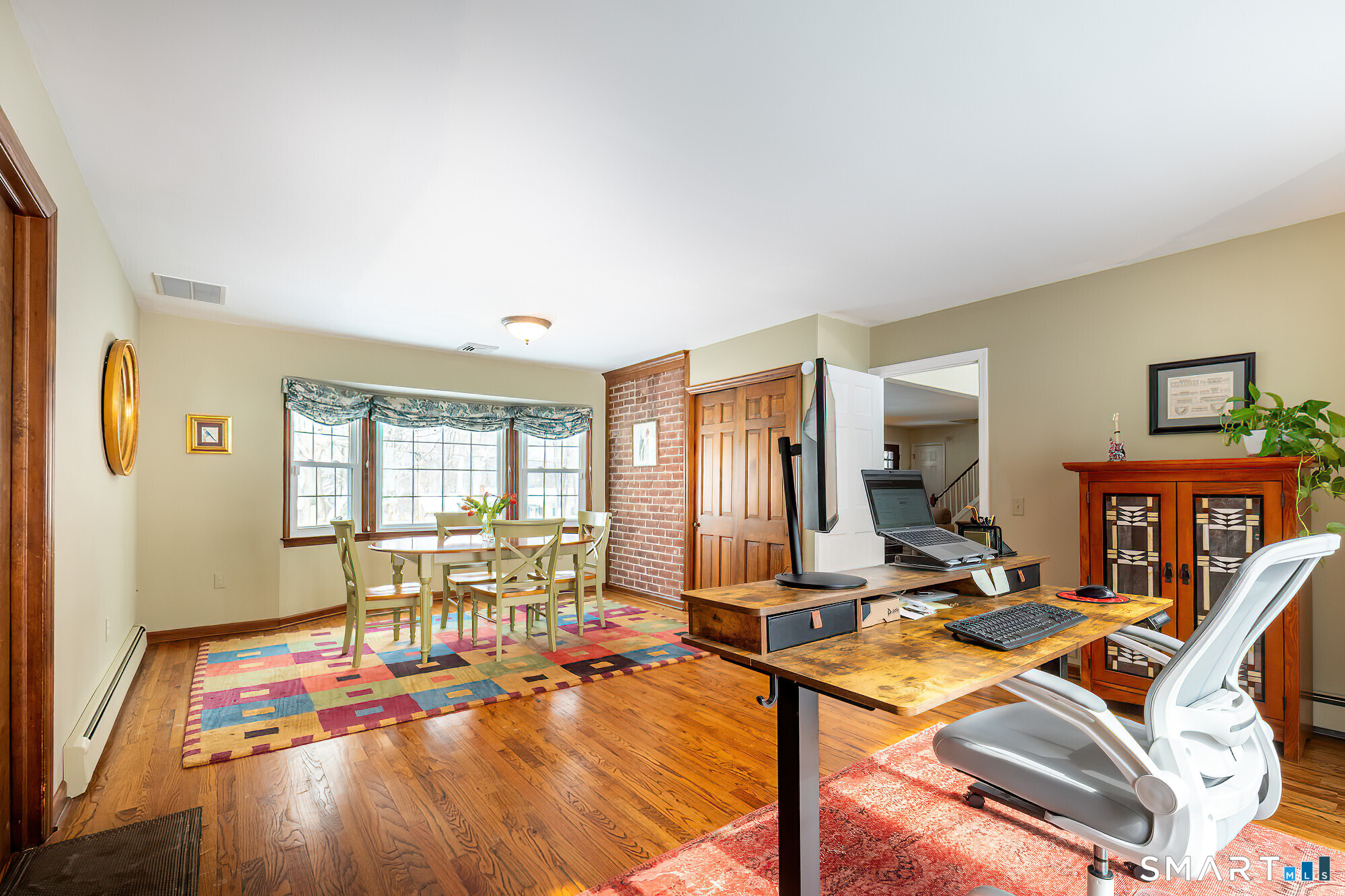35 Highview Drive Ridgefield, CT 06877 - Photo 12 of 35 a view of a livingroom with lounge chair and a large window