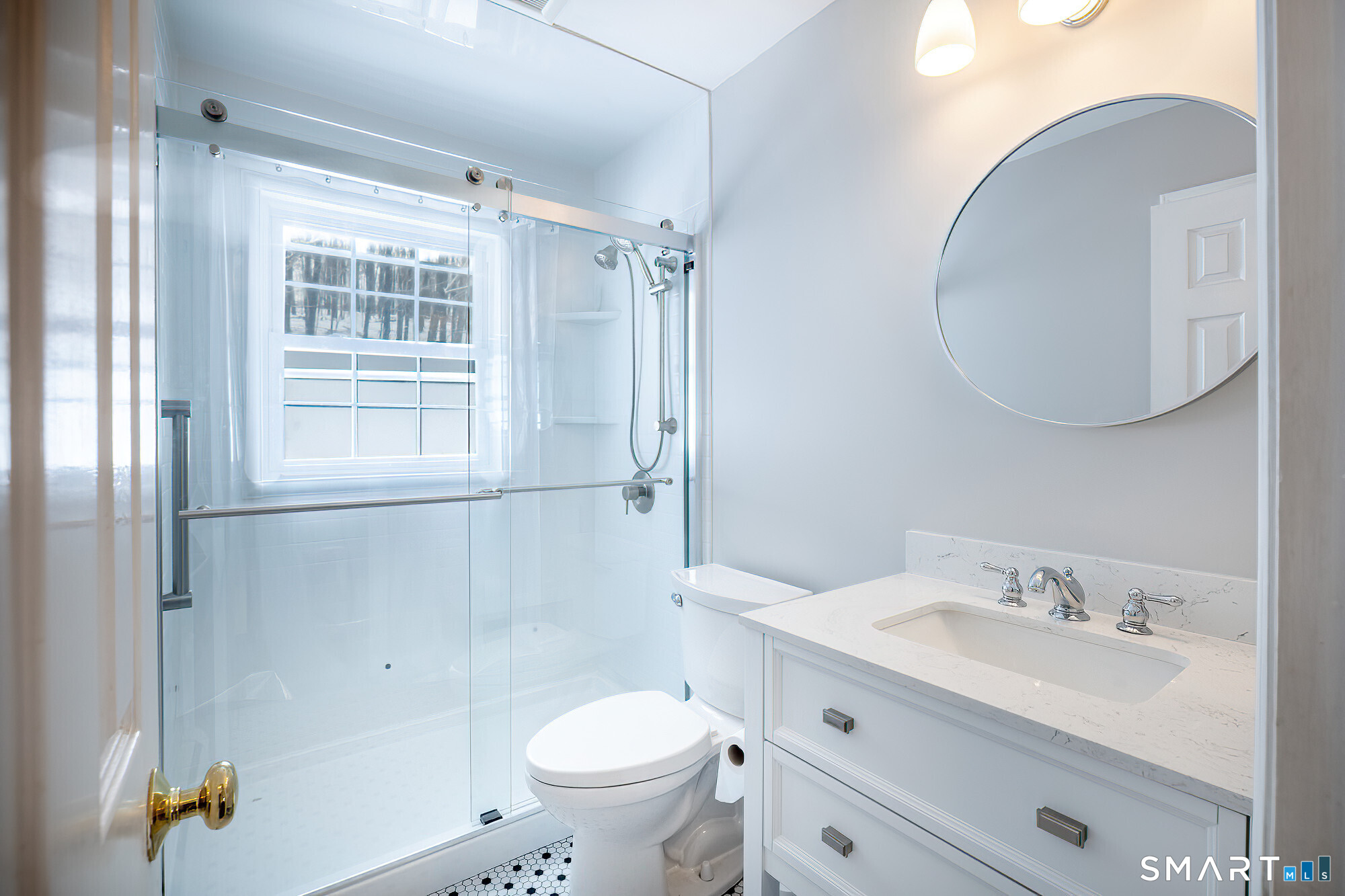 35 Highview Drive Ridgefield, CT 06877 - Photo 16 of 35 a bathroom with a granite countertop sink toilet a mirror and shower