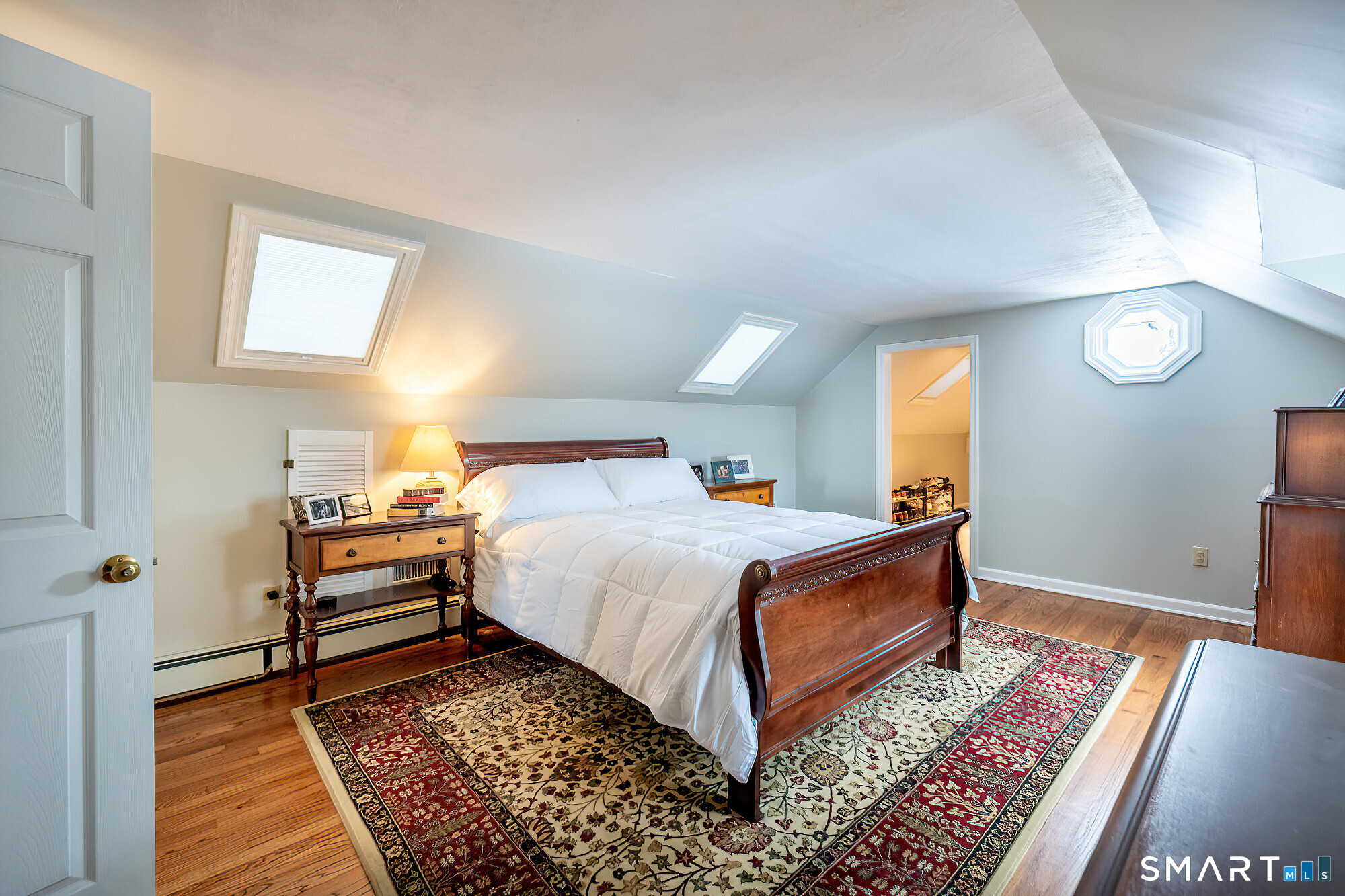 35 Highview Drive Ridgefield, CT 06877 - Photo 21 of 35 a bed room with a bed and a lamp