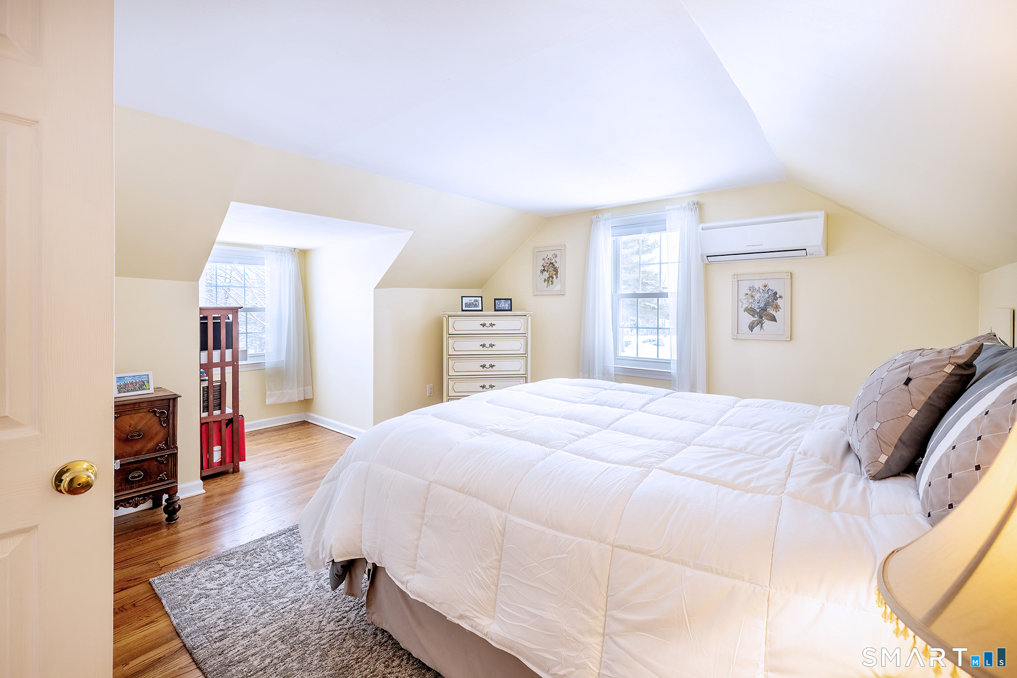 35 Highview Drive Ridgefield, CT 06877 - Photo 24 of 35 a bed room with a bed and a mirror