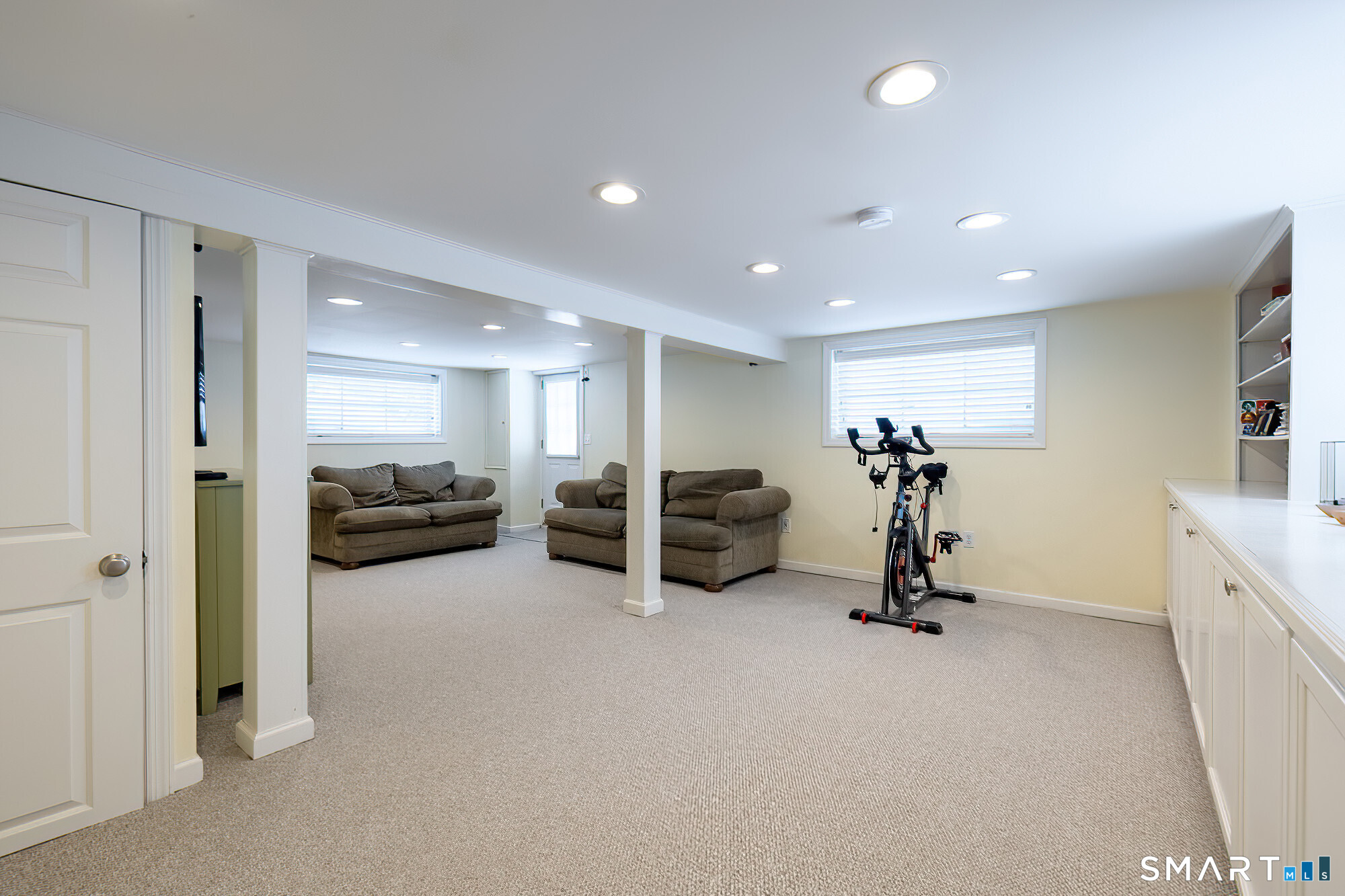 35 Highview Drive Ridgefield, CT 06877 - Photo 29 of 35 a view of a room with gym equipment and a large window
