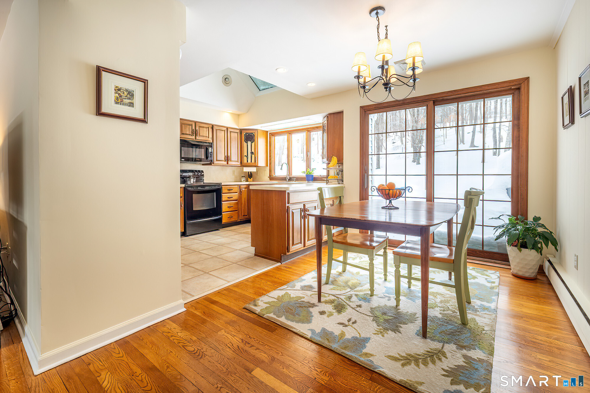 35 Highview Drive Ridgefield, CT 06877 - Photo 7 of 35 a view of a dining room with furniture window and wooden floor