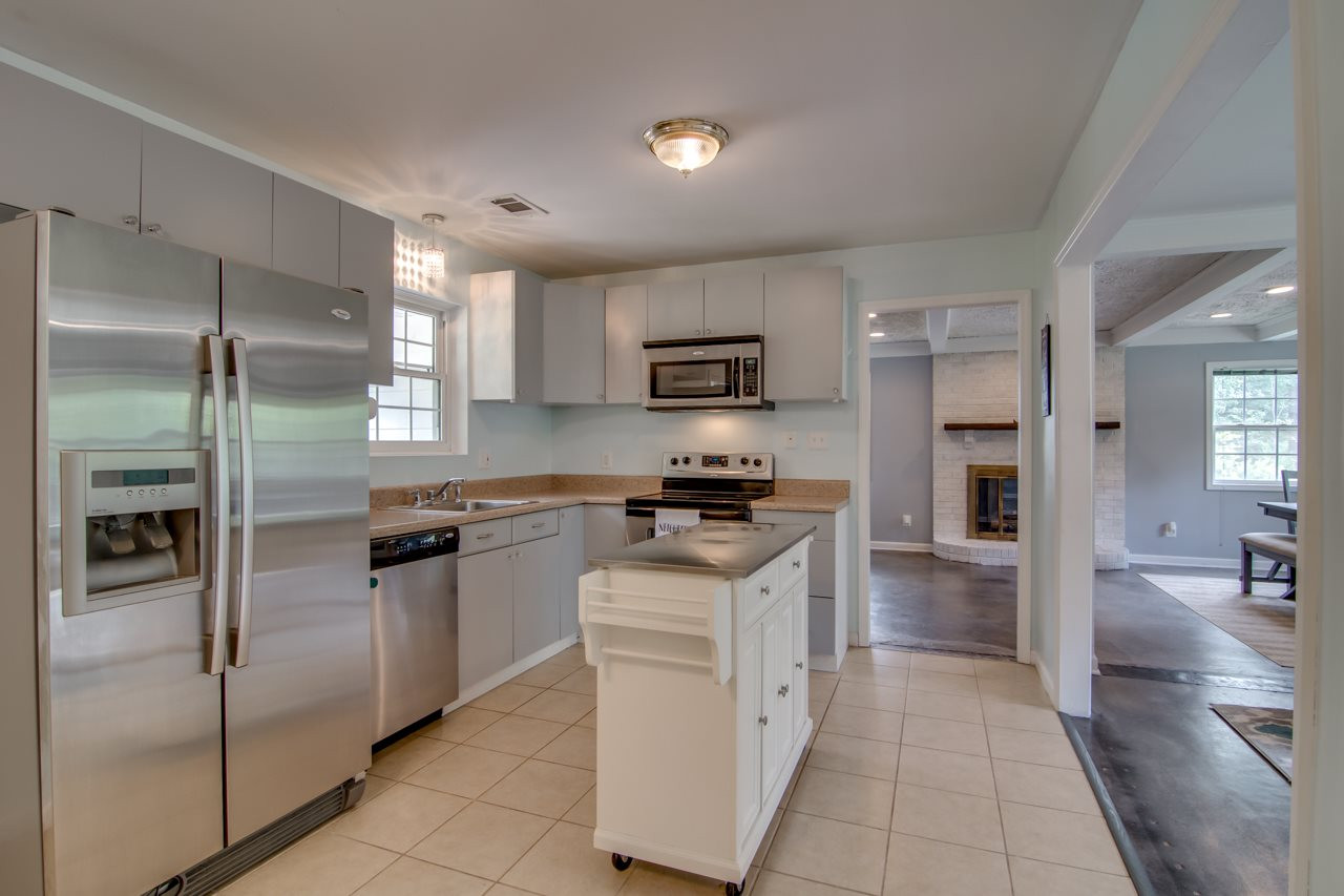 2411 Bonnie Brae Road Durham, NC 27703 - Photo 10 of 27 Kitchen Opens to Family and Living Rooms