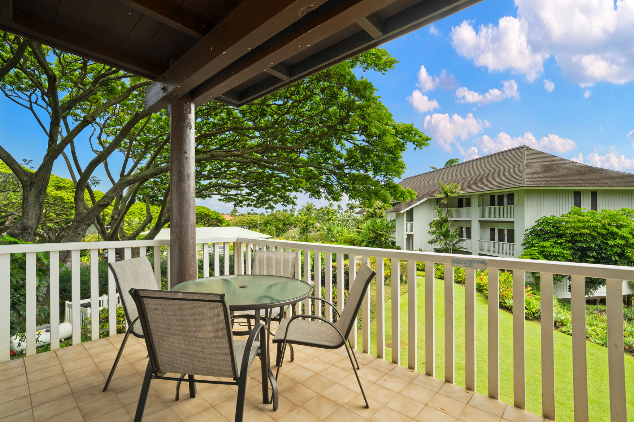 2253 Poipu Road, Unit 330 Koloa, HI 96756 - Photo 17 of 26 a view of a chair and table in the balcony