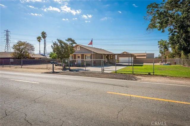a front view of a house with yard