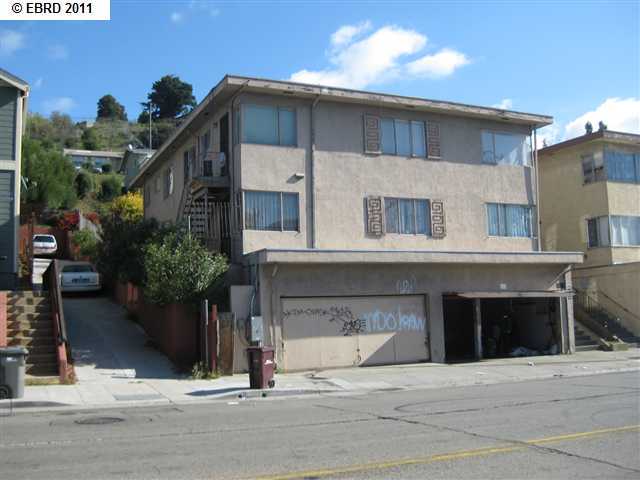 a front view of a house with yard