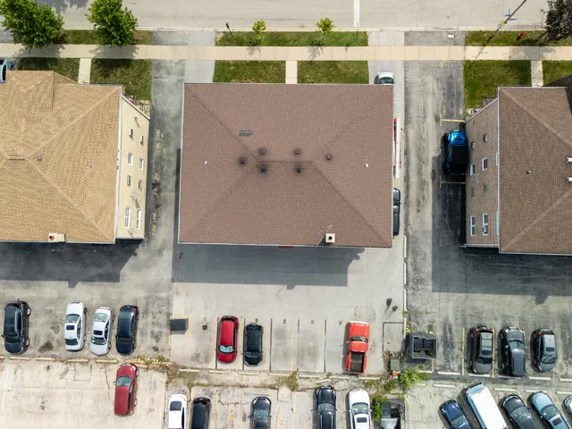a aerial view of a house with outdoor space