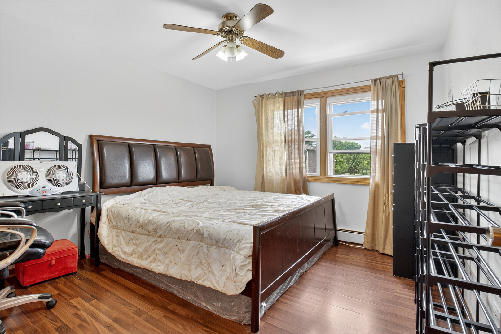 7048 O'Connell Drive, Unit 3W Chicago Ridge, IL 60415 - Photo 7 of 22 a bedroom with a bed and a window
