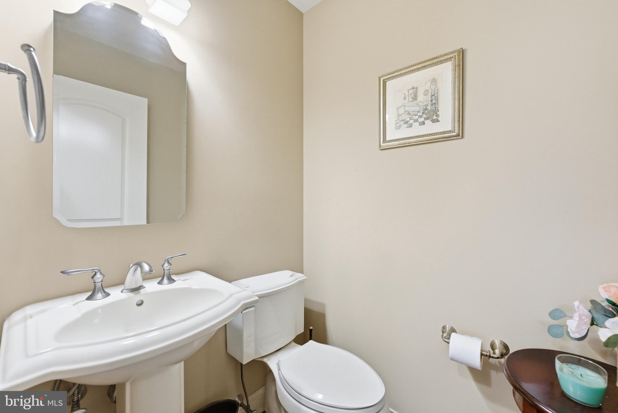3 Stonehurst Drive Voorhees, NJ 08043 - Photo 18 of 43 a bathroom with a toilet sink and mirror