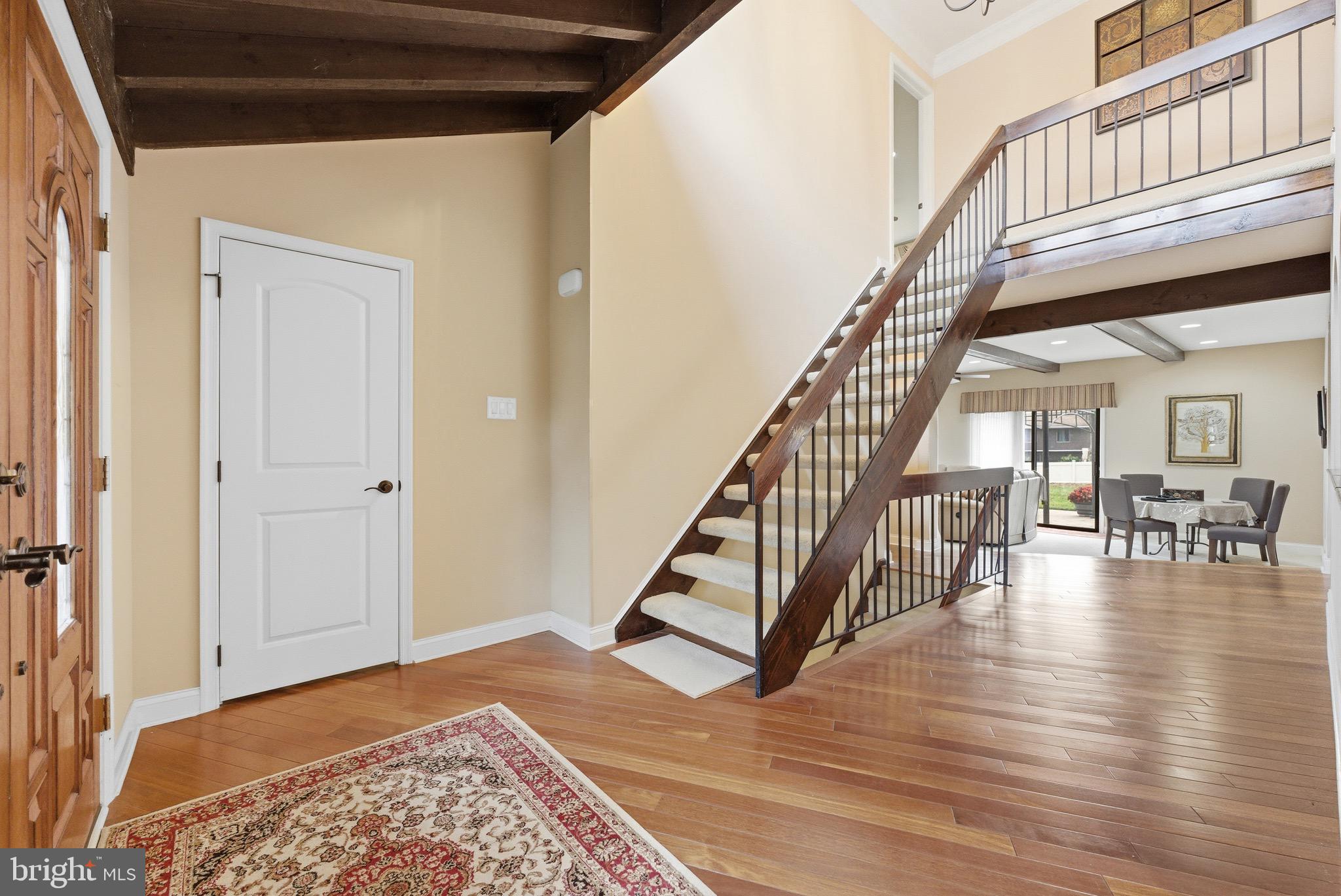 3 Stonehurst Drive Voorhees, NJ 08043 - Photo 19 of 43 a view of an entryway with wooden floor