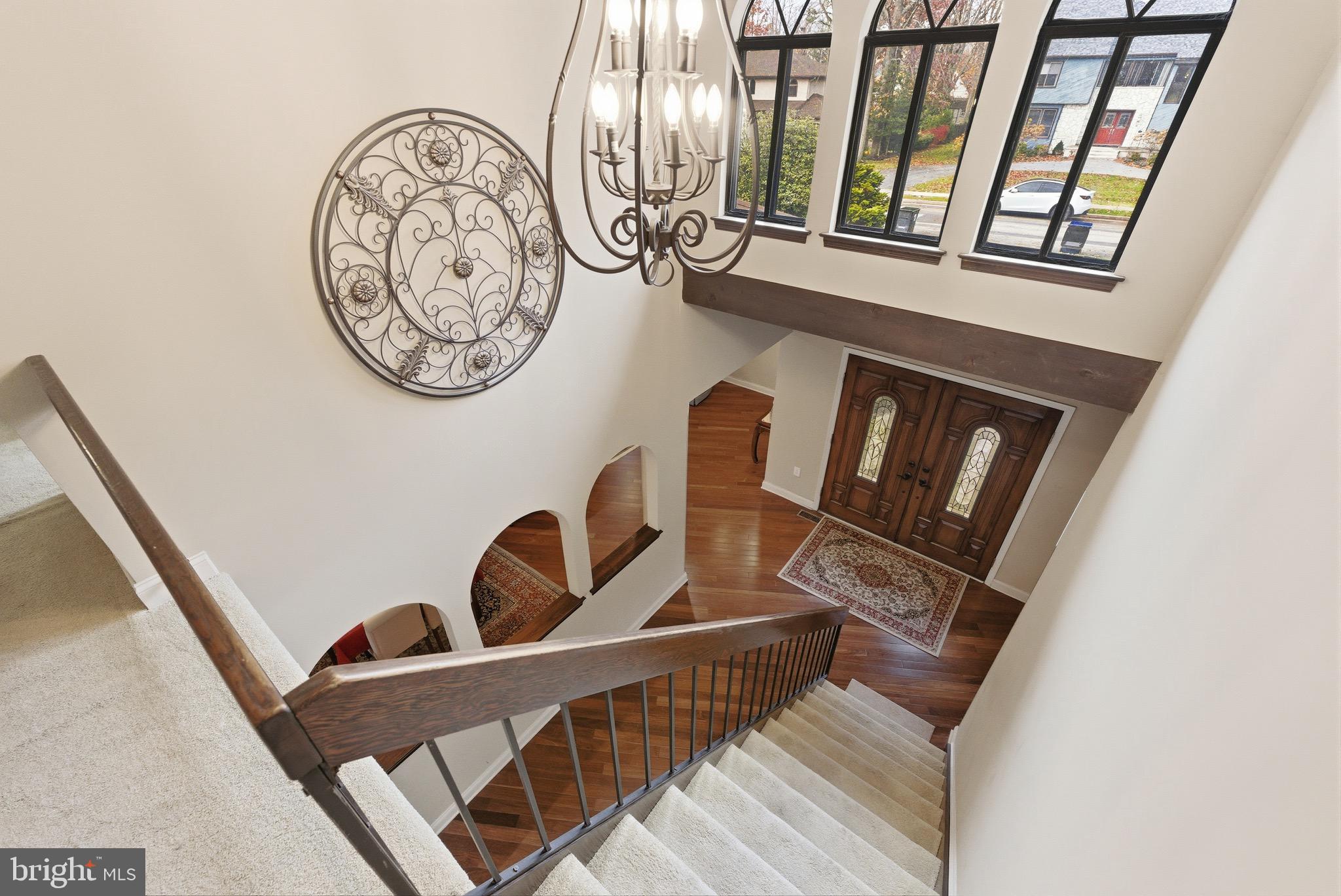 3 Stonehurst Drive Voorhees, NJ 08043 - Photo 29 of 43 a view of a hallway with paintings on the wall