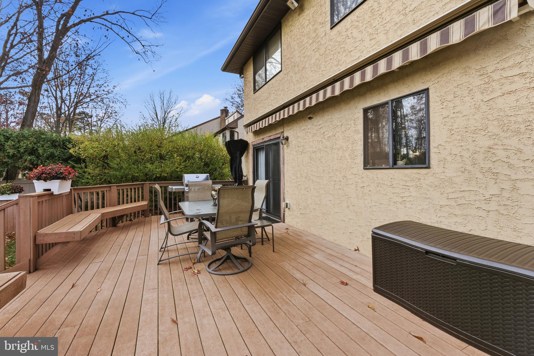 3 Stonehurst Drive Voorhees, NJ 08043 - Photo 35 of 43 a roof deck with a table and chairs