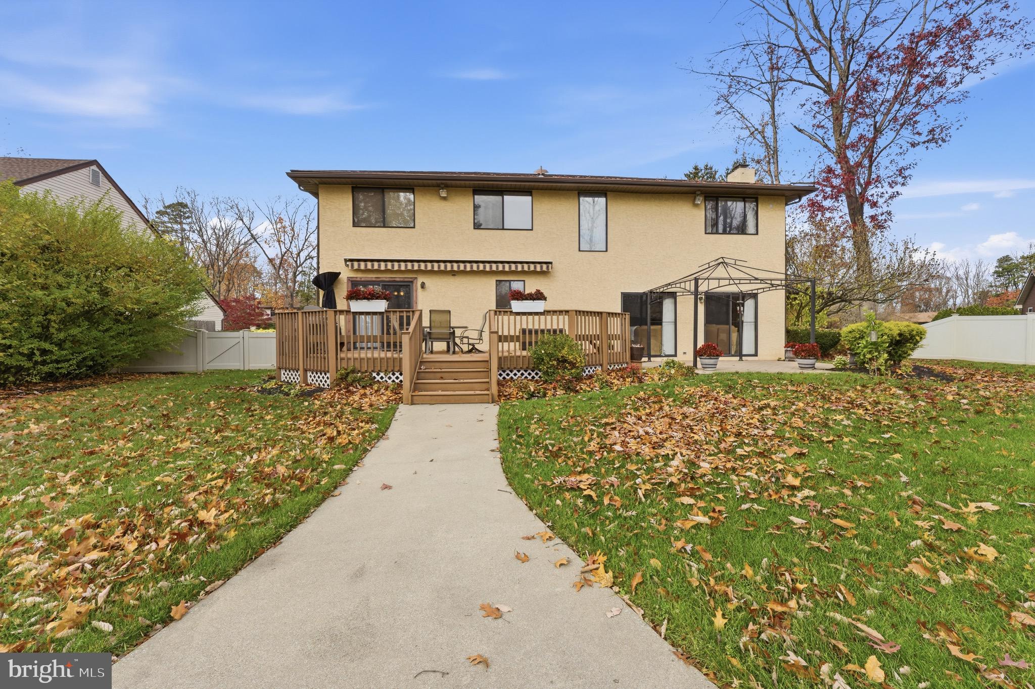 3 Stonehurst Drive Voorhees, NJ 08043 - Photo 41 of 43 a front view of a house with garden