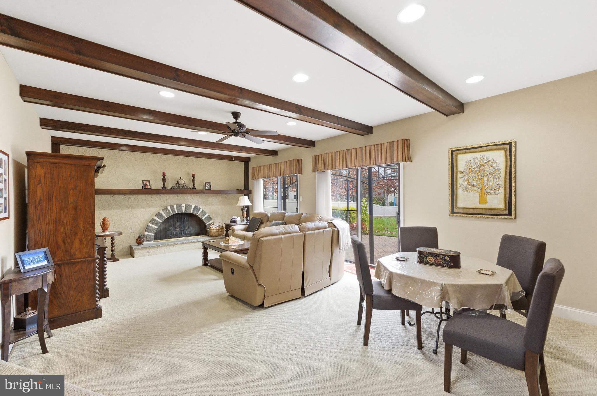 3 Stonehurst Drive Voorhees, NJ 08043 - Photo 10 of 43 a living room with furniture and a window